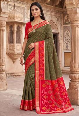 Dark green color pochampally silk blend ikkat design zari border sarees 1