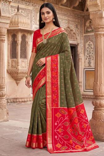 Dark green color pochampally silk blend ikkat design zari border sarees