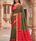 Dark green color pochampally silk blend ikkat design zari border sarees