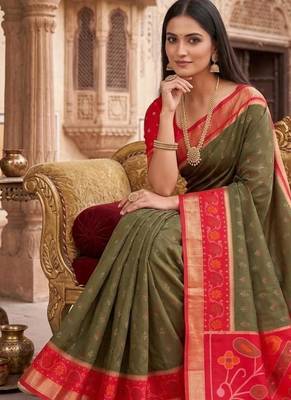 Dark green color pochampally silk blend ikkat design zari border sarees 2
