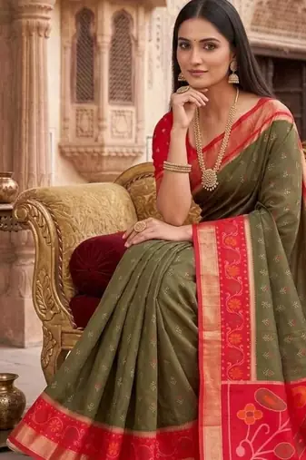 Dark green color pochampally silk blend ikkat design zari border sarees