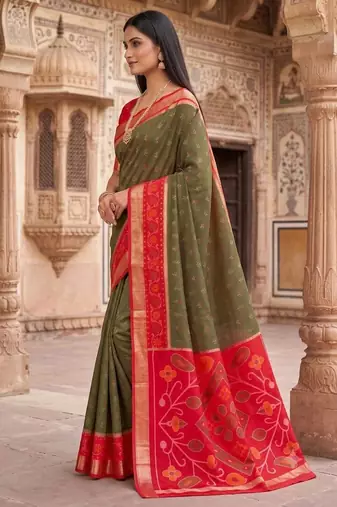 Dark green color pochampally silk blend ikkat design zari border sarees