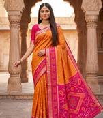 Orange color pochampally silk blend ikkat design zari border sarees