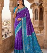 Purple blue color pochampally silk blend ikkat design zari border sarees