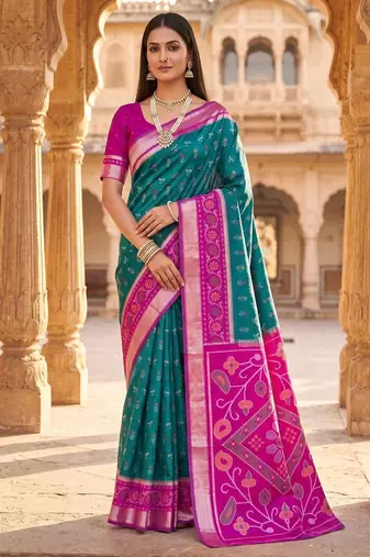 Sea green color pochampally silk blend ikkat design zari border sarees