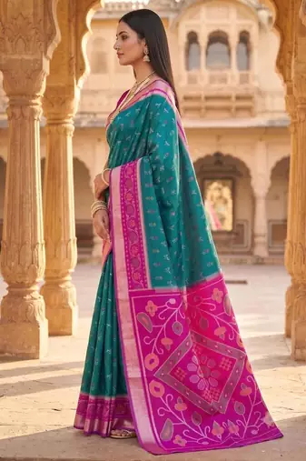 Sea green color pochampally silk blend ikkat design zari border sarees
