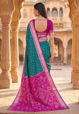 Sea green color pochampally silk blend ikkat design zari border sarees 4