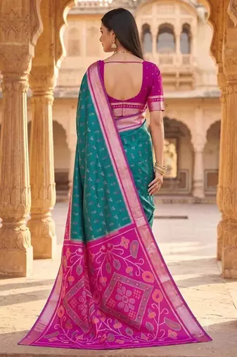 Sea green color pochampally silk blend ikkat design zari border sarees