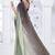 pista & black color fendy silk blend two tone shaded zircon work saree