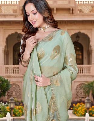 dusty pista color fendy silk blend foil print with zircon work saree 4