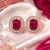 Rose gold ruby halo stud earrings