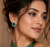 Rhodium green halo stud earrings