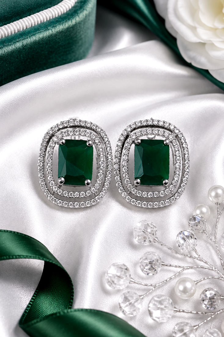 Rhodium green halo stud earrings