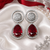 Rhodium ruby royale teardrop earrings