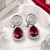 Rhodium ruby royale teardrop earrings