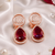 Rose ruby royale teardrop earrings