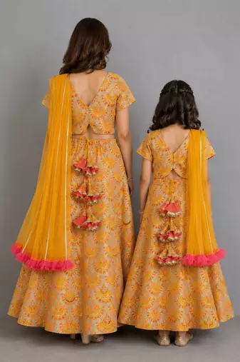 Mustard yellow embroidered cotton silk mother daughter lehenga combo set