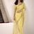 yellow linen woven border saree