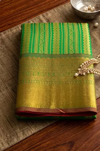 green color kanjivaram silk blend woven designer ethnic partywear saree