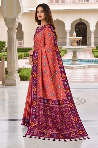 gajri color smart and rich woven meenakari jacquard designer patola silk blend saree