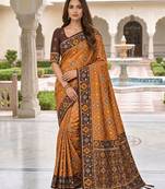 maroon color smart and rich woven meenakari jacquard designer patola silk blend saree