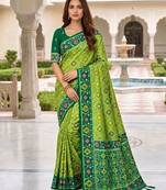 green color smart and rich woven meenakari jacquard designer patola silk blend saree