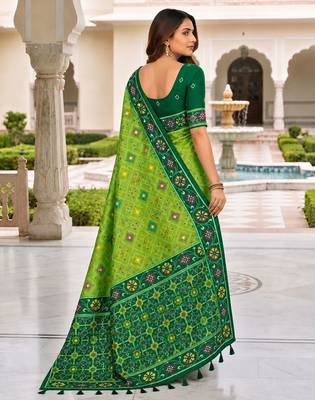 green color smart and rich woven meenakari jacquard designer patola silk blend saree 2