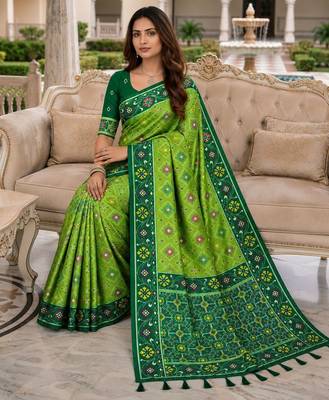 green color smart and rich woven meenakari jacquard designer patola silk blend saree 5
