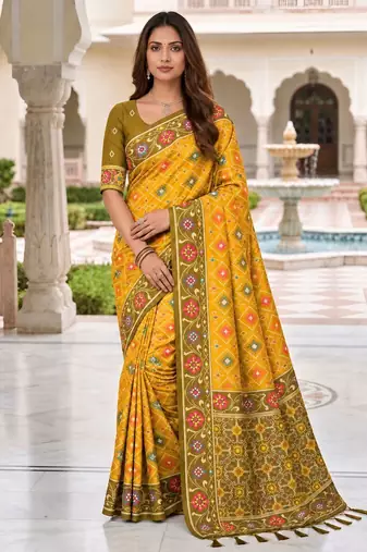 yellow color smart and rich woven meenakari jacquard designer patola silk blend saree