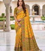 yellow color smart and rich woven meenakari jacquard designer patola silk blend saree