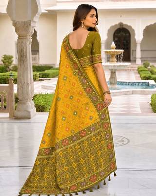 yellow color smart and rich woven meenakari jacquard designer patola silk blend saree 2