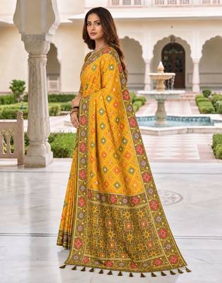 yellow color smart and rich woven meenakari jacquard designer patola silk blend saree 4