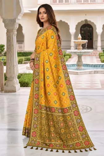 yellow color smart and rich woven meenakari jacquard designer patola silk blend saree