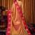 orange color smart and ethnic soft tissue woven designer saree