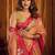orange color smart and ethnic soft tissue woven designer saree