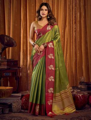 green color smart and ethnic soft tissue woven designer saree 1
