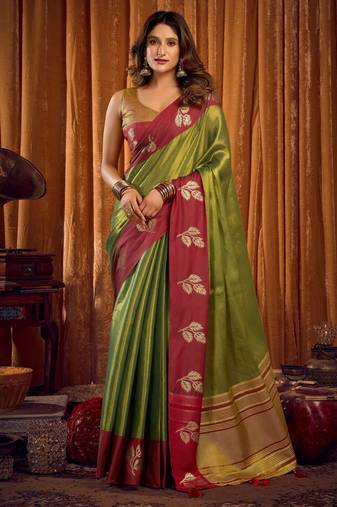 green color smart and ethnic soft tissue woven designer saree