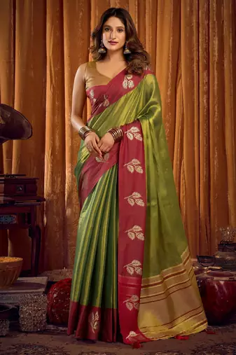 green color smart and ethnic soft tissue woven designer saree