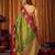 green color smart and ethnic soft tissue woven designer saree