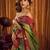 green color smart and ethnic soft tissue woven designer saree