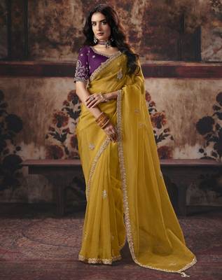 mustard color heavy work rich wedding reception organza fabric saree 1