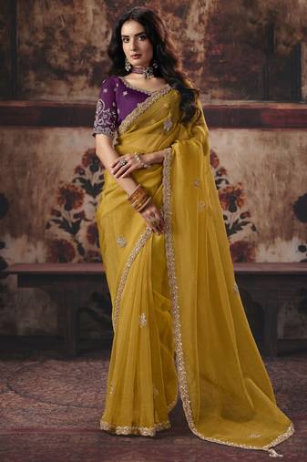 mustard color heavy work rich wedding reception organza fabric saree