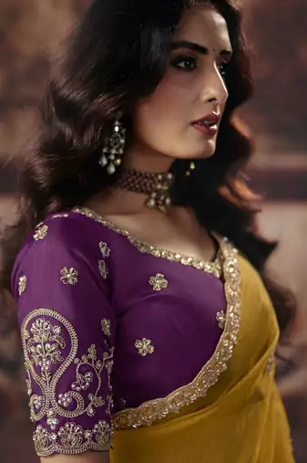 mustard color heavy work rich wedding reception organza fabric saree