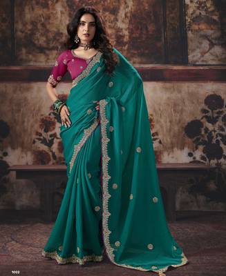 teal color heavy work rich wedding reception bemberg fabric saree 1