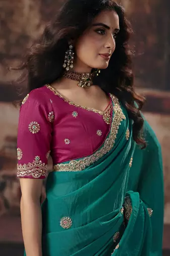 teal color heavy work rich wedding reception bemberg fabric saree