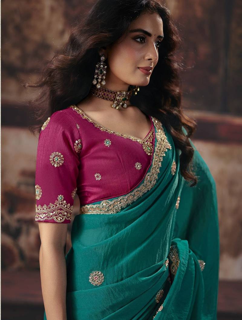 teal color heavy work rich wedding reception bemberg fabric saree