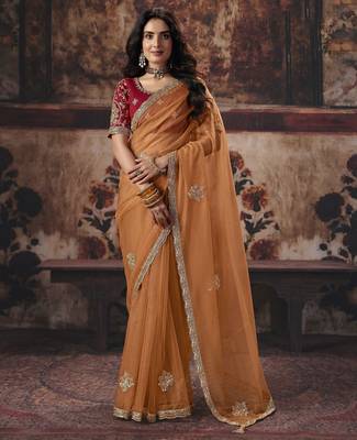 orange color heavy work rich wedding reception organza fabric saree 1