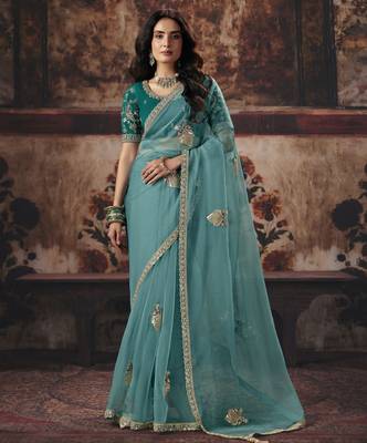 blue color heavy work rich wedding reception organza fabric saree 1