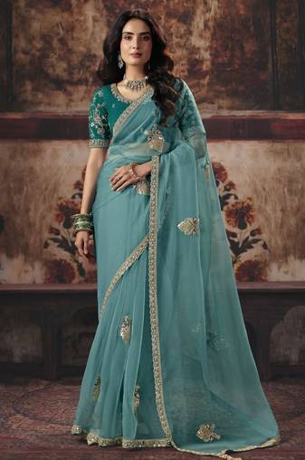 blue color heavy work rich wedding reception organza fabric saree