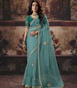 blue color heavy work rich wedding reception organza fabric saree